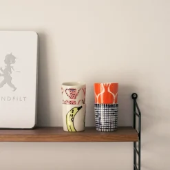 Kopp liten rutig blå