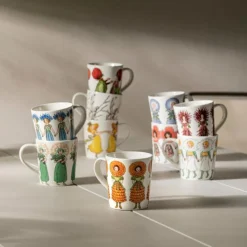 Mugg m öra Prästkrage 40 cl