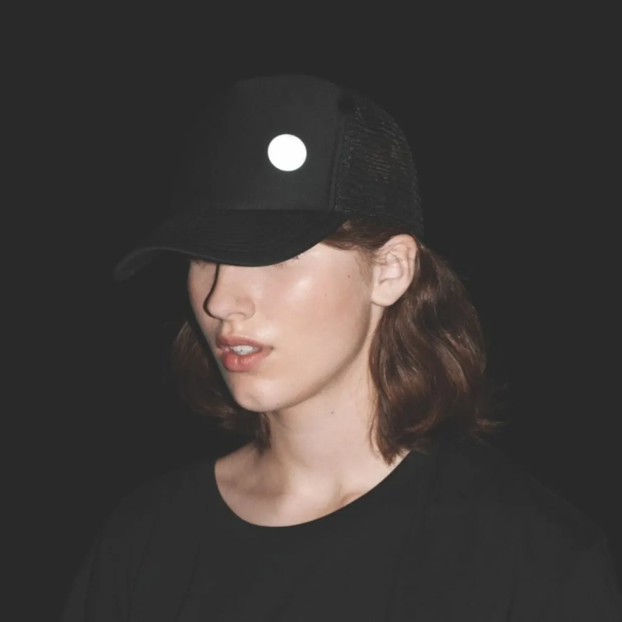 Reflekterande pin liten svart