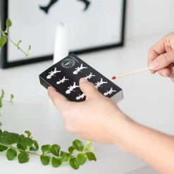 Tändstickor svart solstickan